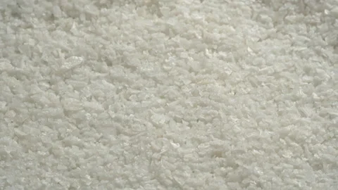 Rotating Macro Coarse White Sea Salt Texture Background Stock Footage 331851179