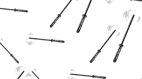 Rotating magic wands on a white screen. Stock Footage 255787277