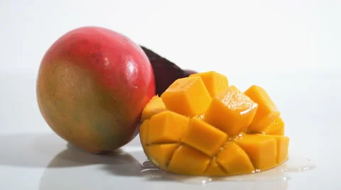 Rotating mango and avocado. Slow Motion. Video stock 55885373