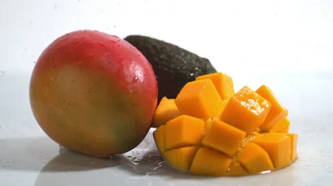 Rotating mango and avocado. Slow Motion. Stock Footage 55885943
