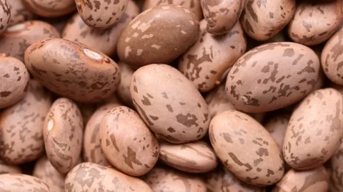 Rotating marble beans shot from above Stock Footage 119203121