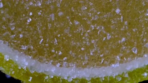 Rotating marmalade in form of lemon slices in sugar Stock Footage 218317625