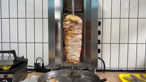 Rotating Meat Roasting on Shawarma Spit Stock Footage 318912209