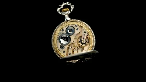 Rotating mechanism of the old clock. Close up. Timelapse . Back background Video stock 98122465