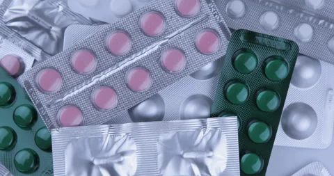 Rotating medication blisters of tablets and pills Stock-Footage 128473361