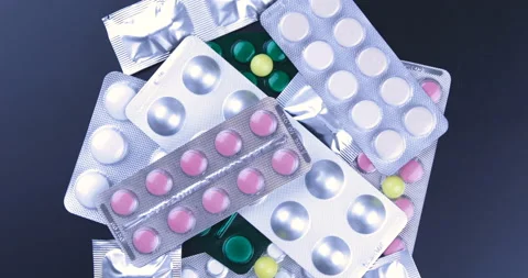 Rotating medication blisters of tablets and pills Stock-Footage 128474000