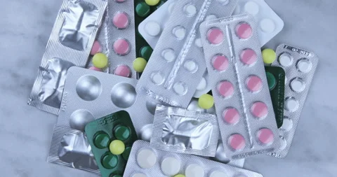 Rotating medication blisters of tablets and pills Stock-Footage 128475215