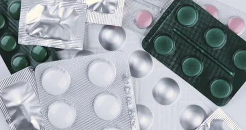 Rotating medication blisters of tablets and pills Stock Footage 129311884