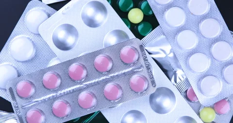 Rotating medication blisters of tablets and pills Stock Footage 129312186