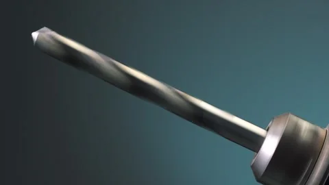 Rotating Metal Drill Bit on Blue Backdrop. Stock Footage 257489963