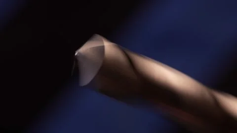 Rotating a Metal Drill Bit on a striped background. Stock Footage 257489756