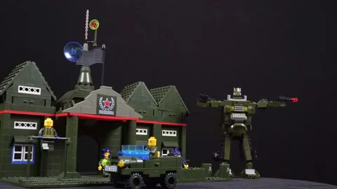 Rotating Military Model Commandant's Office And Robot Transformer On A Black Bac Stock Footage 172537026