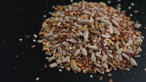 Rotating of mixed seeds. Stock Footage 96694110