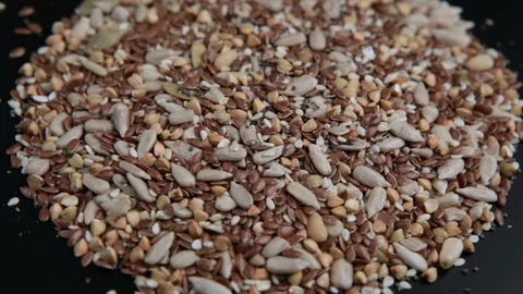 Rotating of mixed seeds in slow motion Stock Footage 96193665