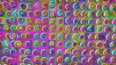 Rotating multi-colored spheres on cylinders slowly rise and fall into three-dime Stock-Footage 152910959