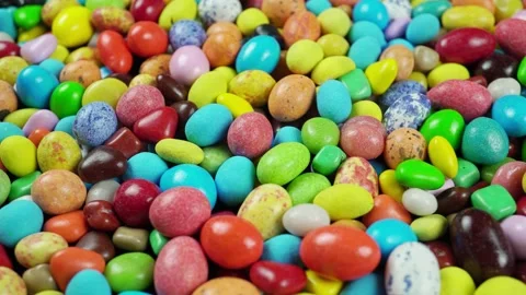 Rotating Multicolored Chocolate Dragee Galore. Video stock 235521359