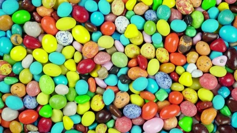 Rotating Multicolored Dragees In Assortment Top View. Stock Footage 235521708