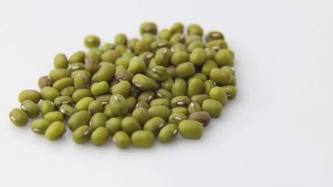 Rotating of mung beans on white background. Side view. Stock Footage 136050439