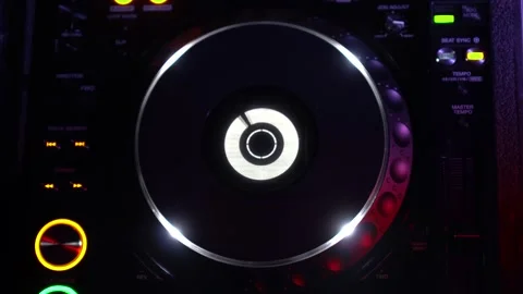 Rotating music record on a DJ console in a disco. Footage. Close-up of musical Stock-Footage 146401030