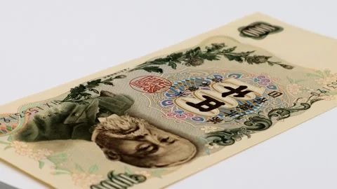 A rotating old 1000 yen bill Stock-Footage 336494133