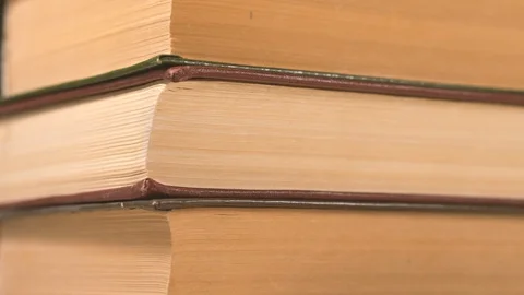 Rotating old books close-up. Knowledge and education. Printed literature Video stock 122951591