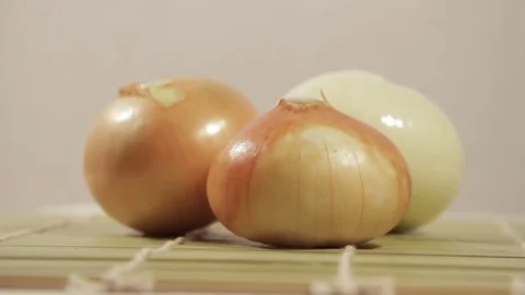 Rotating onion on a light background Stock Footage 69948117