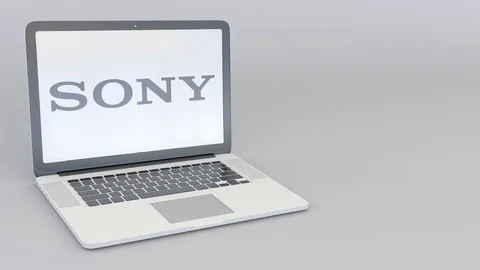 Rotating opening and closing laptop with Sony Corporation logo. Computer Stock Footage 73102199