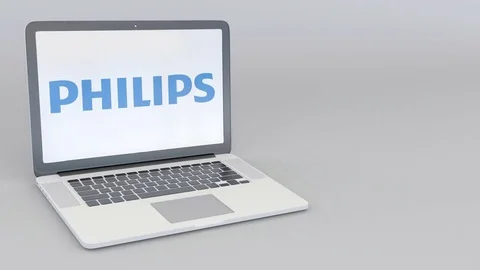 Rotating opening and closing laptop with Philips logo. Computer technology Stock Footage 73102290