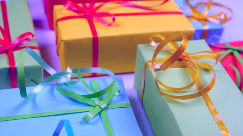 Rotating or spinning background with holiday gift boxes in different colors Stock Footage 221218705