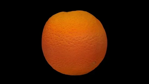 Rotating Orange on Black Background Video stock 79429060