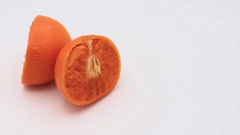 A rotating orange cut in half Stock Footage 336655252
