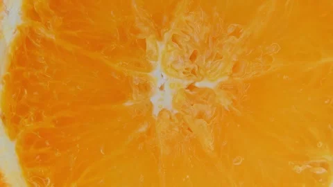 Rotating Orange Fruit Slice Close Up Background. 스톡 동영상 334575781
