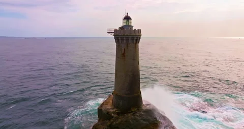 A rotating overhead shot of Phare du Four a lighthouse in Bretagne France. An Stock Footage 304711806