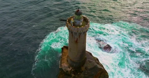 A rotating overhead shot of Phare du Four a lighthouse in Bretagne France. An 스톡 동영상 304712704