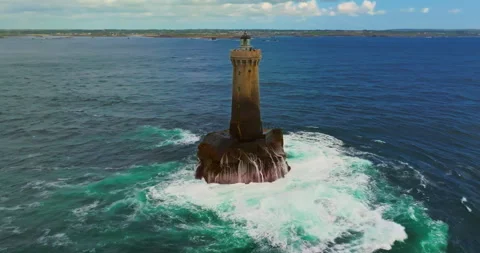 A rotating overhead shot of Phare du Four a lighthouse in Bretagne France. An Stock-Footage 311244967