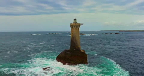 A rotating overhead shot of Phare du Four a lighthouse in Bretagne France. An Видео 311279700