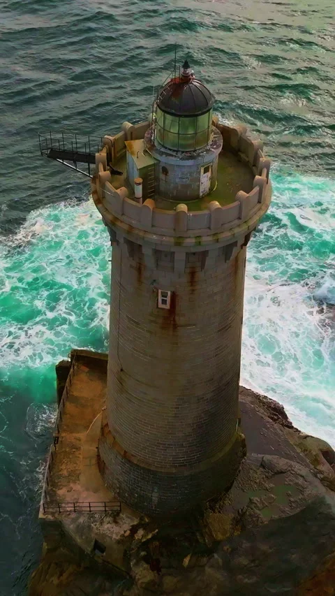 A rotating overhead shot of Phare du Four a lighthouse in Bretagne France. An 스톡 동영상 319940390