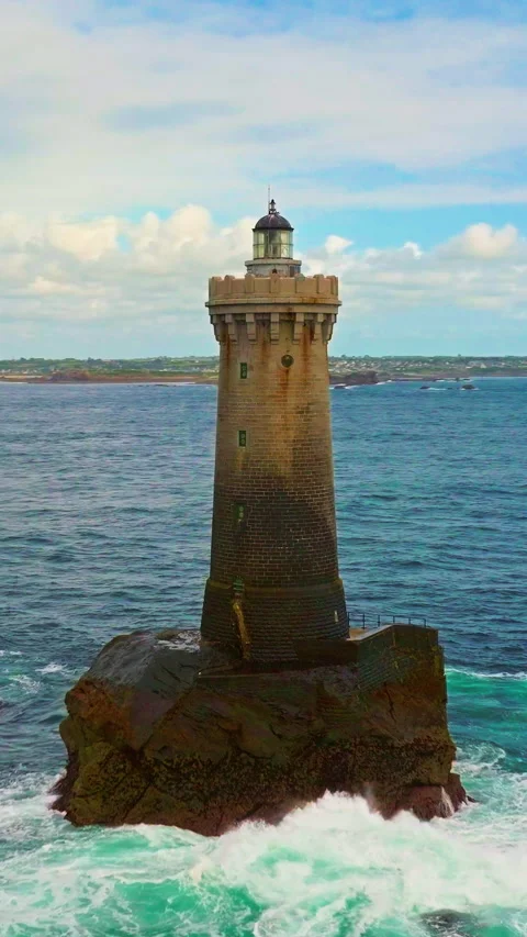 A rotating overhead shot of Phare du Four a lighthouse in Bretagne France. An Video stock 320873698