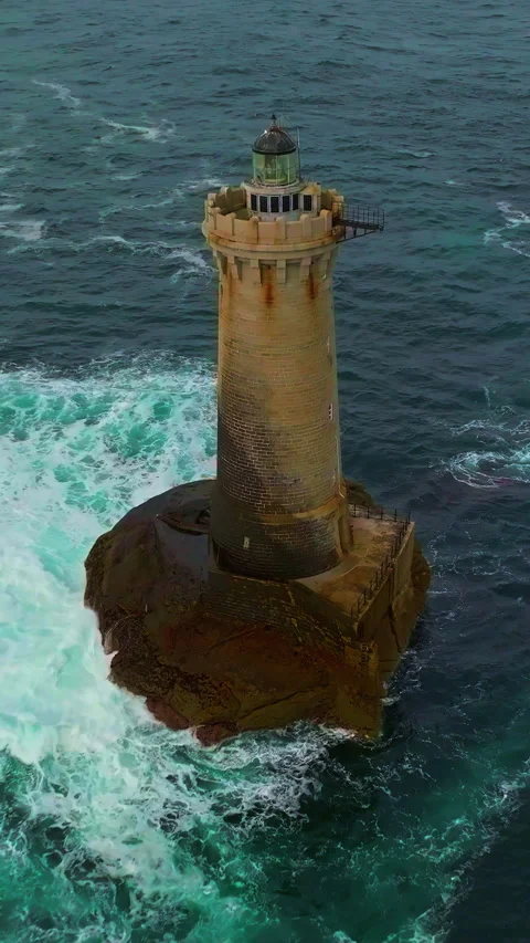 A rotating overhead shot of Phare du Four a lighthouse in Bretagne France. An Stock Footage 320902366