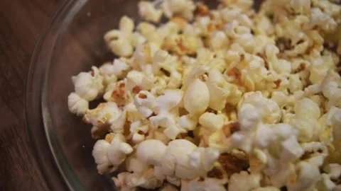 Rotating Overhead View of Butter and Chocolate Popcorn Stock-Footage 344008188