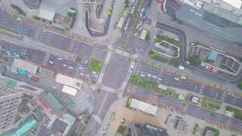 Rotating overhead view of a Guangzhou intersection in China Stock Footage 345955232
