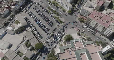 Rotating overhead view of rows of parked cars in Tangier Video stock 347838643
