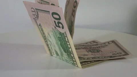 Rotating a pack of 50 dollar bills Stock Footage 93361300