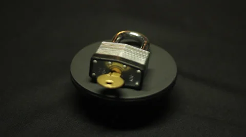 Rotating padlock with key Video stock 32346724