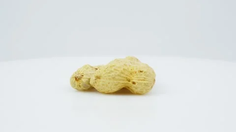 Rotating Peanuts Isolated on White Background Stock Footage 326979601