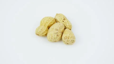 Rotating Peanuts Isolated on White Background Stock Footage 326979612