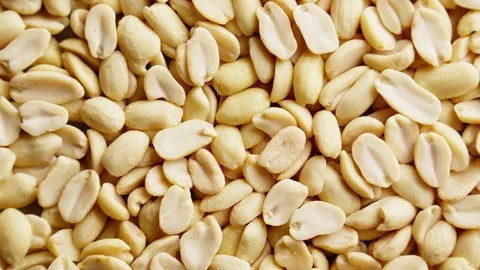 Rotating peanuts. View from above. Healthy vegan food concept. Peeled peanut. Stock Footage 289446584