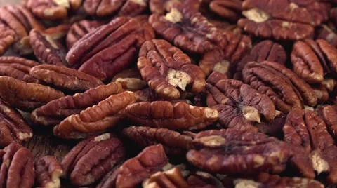 Rotating Pecan Nuts (seamless loopable) Stock Footage 61352889