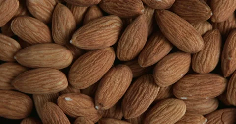 Rotating peeled almonds Stock Footage 96284467