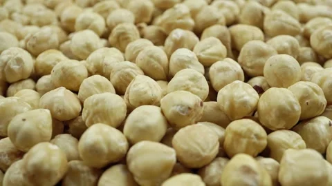 Rotating Peeled Aromatic Blanching Hazelnut. Video stock 242839920